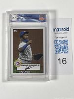 Front image of the 2021 Topps Vladimir Guerrero Jr. baseball card in slab showing player action portrait and grading label