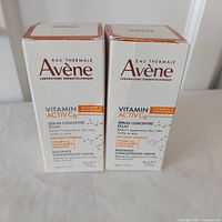 Two boxed bottles of Avene Eau Thermale Vitamin Activ Cg Radiance Concentrated Serum side by side.