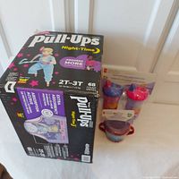 Full box of Huggies Pull-Ups Night Time size 2T-3T 68 count with 3 cups visible