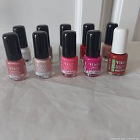 Front angle shot of 10 Vitry mini nail polish bottles showing variety of colors and packaging.
