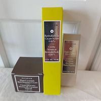 Three Naturium skincare products in original boxes: Plant Ceramide Rich Moisture Cream, Retinaldehyde Cream Serum, Multi-Peptide Eye Cream.