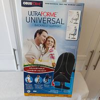 Front of the Obusforme Ultraforme Universal Backrest Support box showing product image, highlighting adjustable lumbar height and ergonomic design.