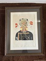 Frontal view of framed print showing entire artwork and frame