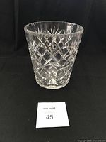 Front view of the cut crystal ice bucket showing diamond and triangular cut pattern.