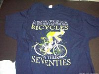Navy blue men's large t-shirt with cyclist graphic and text print
