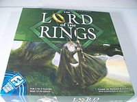 Front of the Lord of the Rings board game box featuring Gandalf image and text indicating for 2-5 players ages 13 to adult.