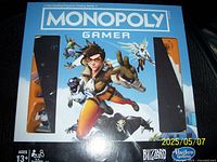 Front of Monopoly Gamer Edition board game box with artwork and branding
