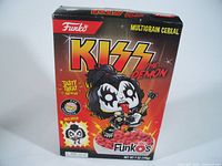 Front view of sealed KISS The Demon Funko multigrain cereal box showing cartoon Gene Simmons character.