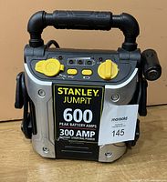 Front view of Stanley Jumpit battery booster showing brand and specs label