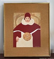 Full view of the framed painting showing a figure in a red and cream robe with a circular design and a textured beige background.