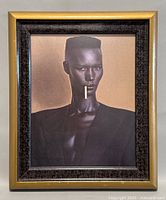 Full framed print showing the gold and black decorative frame around the Grace Jones Nightclubbing image.