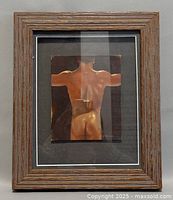Front view of framed painting depicting male nude rear view