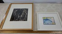 Two framed abstract artworks, one black and white signed and dated 1999 on back, the other colorful framed 11x13 artwork.