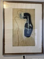 Framed limited edition art print showing abstract figure playing saxophone.