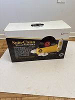 Original box of Spin-Clean Record Washer MK II, showing product name, usage instructions, and product image.
