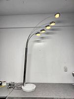 Full-height view of the lamp with lights on