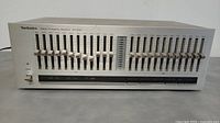 Front overall view of Technics SH-8020 equalizer showing all sliders and controls.