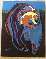 Front view of colorful stylized bear on canvas signed by artist