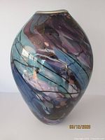 Oblique front view of vase showing overall shape and color pattern