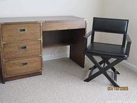 Full view of the Lane wooden desk alongside the black director style chair showing size and design.