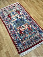 Full-view of rug showing central pattern and border