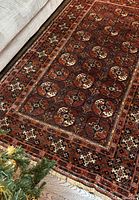 Angled full-field view showing repeating octagonal medallion pattern and border design