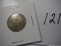 Photo of the 1961 Denmark coin showing the denomination '20 Ore' with a laurel wreath design and the year '1961'.