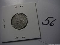 Front side of 1964 Hungarian 20 filler coin displaying denomination distinguishing features and coin holder.