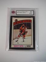 Front of 1976-77 O-Pee-Chee #47 Darcy Rota hockey card graded 9 Mint.