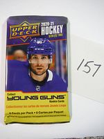 Sealed 2020-21 Upper Deck Hockey Series Two pack with Young Guns rookie cards featuring a player with a blue helmet on the front.