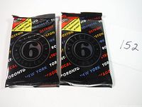 Two unopened 1992 Original 6 hockey trading card packs in black packaging with city names and Original 6 logo.