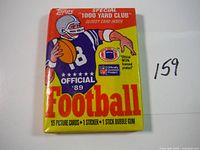 Front of sealed 1989 Topps Football card pack showing colorful NFL player illustration and branding