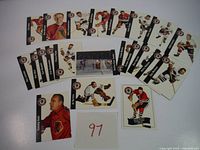 Spread of Chicago Black Hawks Parkhurst Missing Link hockey cards showing players in uniform, arranged face-up on a white surface