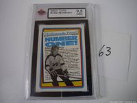 Front of 1990-91 Topps #1 Wayne Gretzky hockey card with grading label showing 9.5 by NGM.
