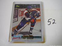 Front of 1995 Classic Hockey card showing Jerome Iginla in Calgary Flames uniform skating on ice.