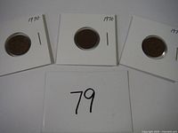 Set of three 1970 Canadian one-cent coins in white cardboard holders with plastic windows, each labeled with the year 1970.