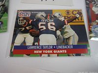 Close-up image of Lawrence Taylor Pro Set football trading card showing him in New York Giants uniform with number 56, labeled Linebacker.