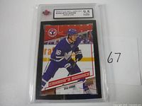 Front image of the graded 2016-17 Mitch Marner rookie card in Toronto Maple Leafs uniform showing 'Canada's Rookies' with grade label of 9.5 NGM by KSAC.
