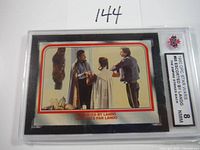Close-up of graded 1980 OPC Star Wars Empire Strikes Back trading card featuring Lando Calrissian, graded NMM 8.