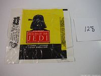 Full view of the 1983 Star Wars Return Of The Jedi wax pack wrapper featuring Darth Vader image and product details.