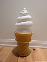 Front view of the ice cream cone bank lamp upright