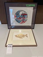 Two framed Indigenous art prints displayed together