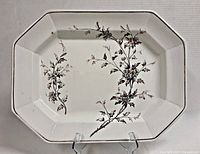 Full view of octagonal platter displaying hawthorn floral design and overall condition.