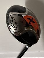 Close up of the clubhead showing Callaway branding, X series logo in red, 19° loft marking and 5W designation on one side.