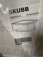 Close-up of SKU label showing dimensions 44x55x19 cm (17 1/4" x 21 3/4" x 7 1/2") for a SKUBB storage box.