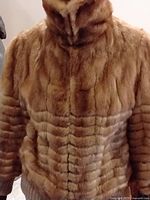 Front view of ladies sable fur jacket showing full length and texture details.