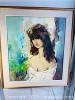 Full view of the oil painting showing the portrait of a young woman with dark hair and abstract background, framed.