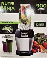 Photo of front packaging showing Nutri Ninja 900 watts with 530ml and 710ml Nutri Ninja cups filled with fruit and ice.