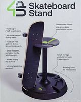 Photo of the 4Up Skateboard Stand product showing key features: holds 4 skateboards, rubber grip, rotating base, small footprint.