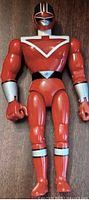 Front view of 12 inch Red Time Force Power Ranger action figure showing red suit with silver details and helmet visor.